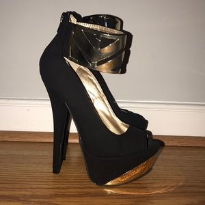 Black and gold heels